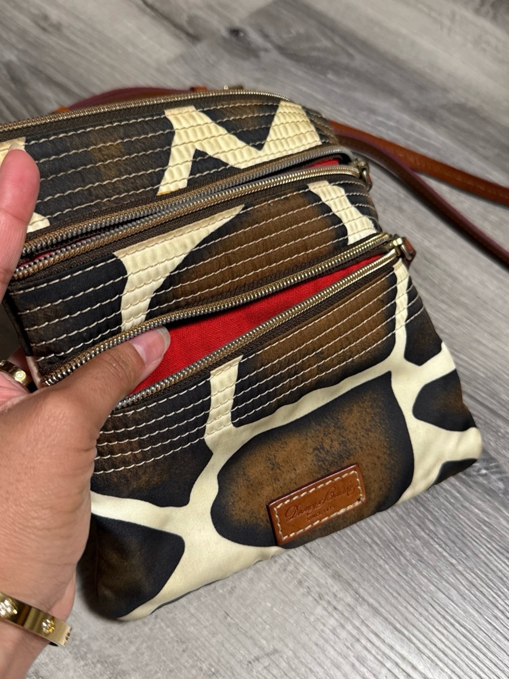 Dooney & Bourke Brown Cream Giraffe Print Crossbody Bag with Red Interior
